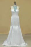 2024 Halter Prom Dresses Satin With Beads And Rhinestones PDJ52A2T