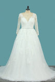 2024 A Line Tulle V Neck Long Sleeves Wedding Dresses With Applique And Beads PDQ6Z4KG