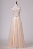 2024 Beaded Bodice V Neck Backless A Line/Princess Prom Dress With Tulle PMGCTYX5