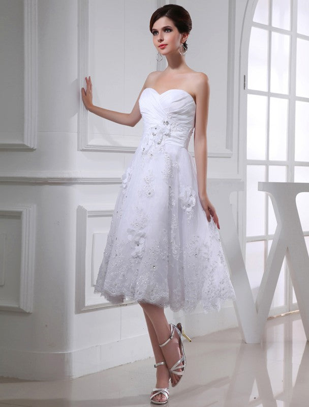 A-Line/Princess Beading Sweetheart Sleeveless Organza Applique Taffeta Wedding Dresses TPP0006880