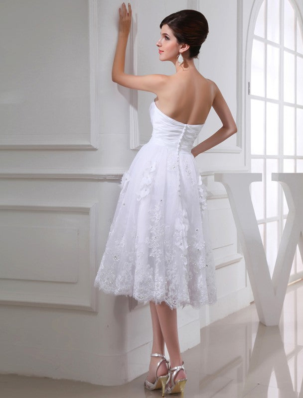 A-Line/Princess Beading Sweetheart Sleeveless Organza Applique Taffeta Wedding Dresses TPP0006880