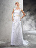 Sheath/Column Sheer Neck Hand-Made Flower Sleeveless Long Satin Wedding Dresses TPP0006901